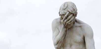 statue of a man showing disappointment under a clo 2023 11 27 05 34 11 utc